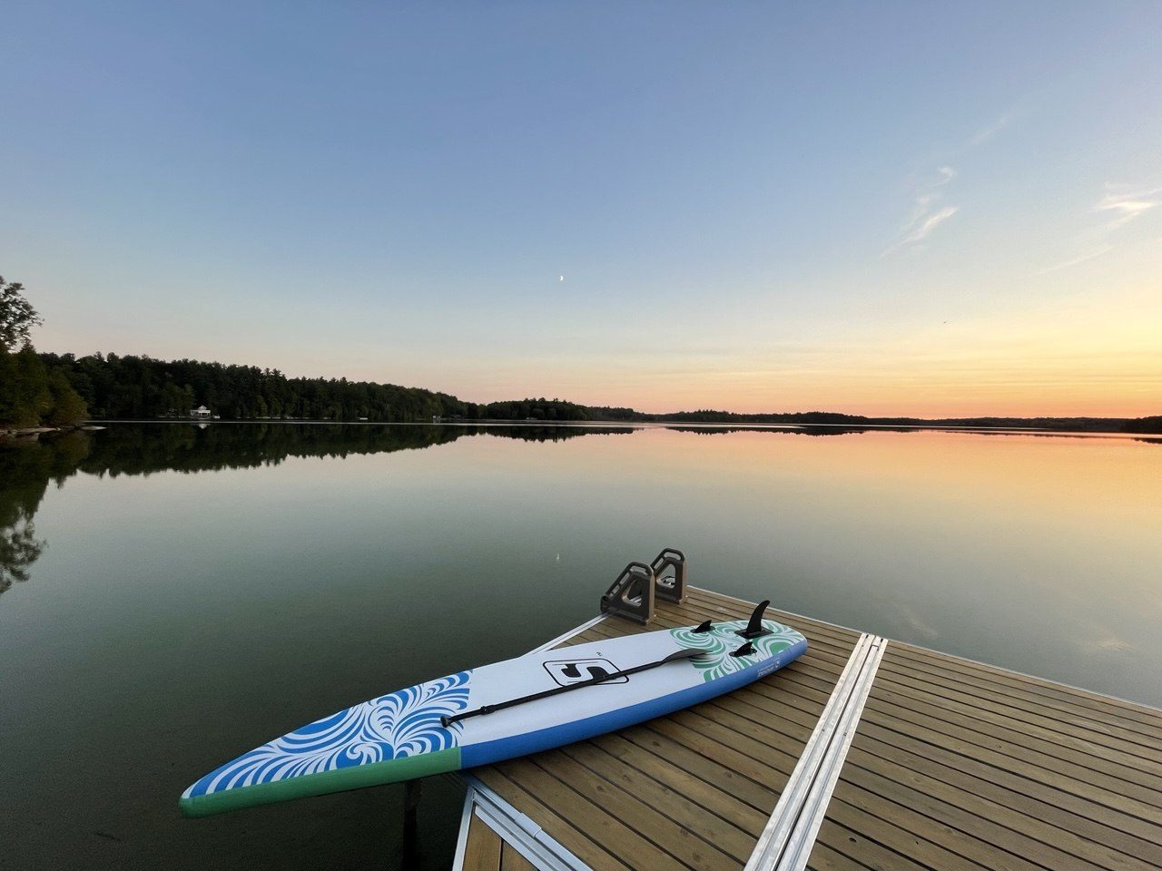 The dock and lake on a clear day