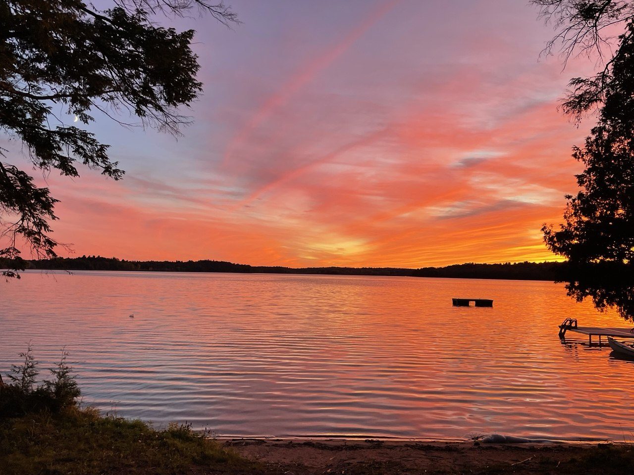 Wide sunset over Grippen Lake with the dock